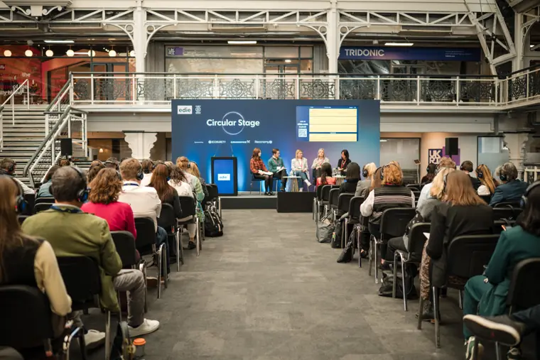 Audience following a discussion on the Circular Stage.