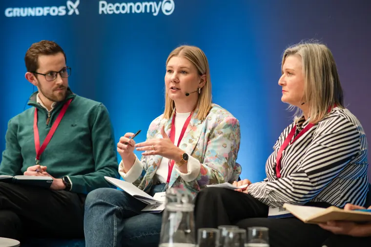 Speaker sharing insights during a panel.