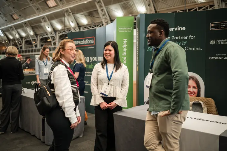 Foundervine team engaging with visitors.