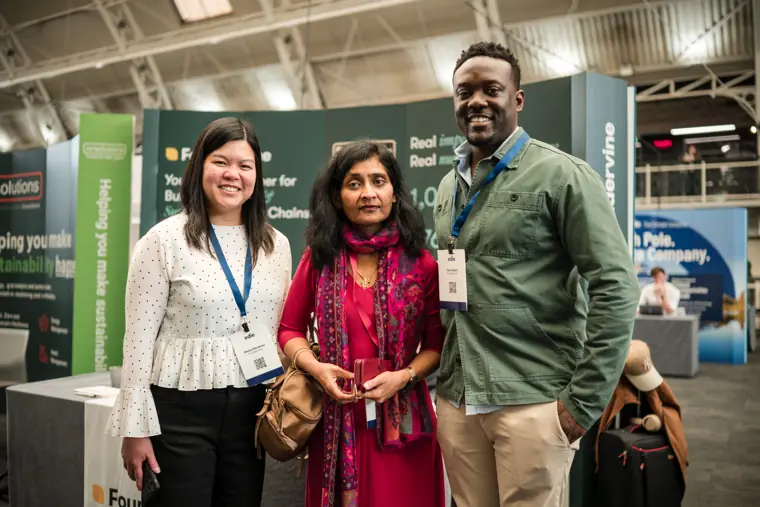 Foundervine team and visitor at the stand.