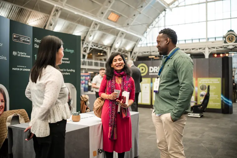 Conversation on the exhibition floor.