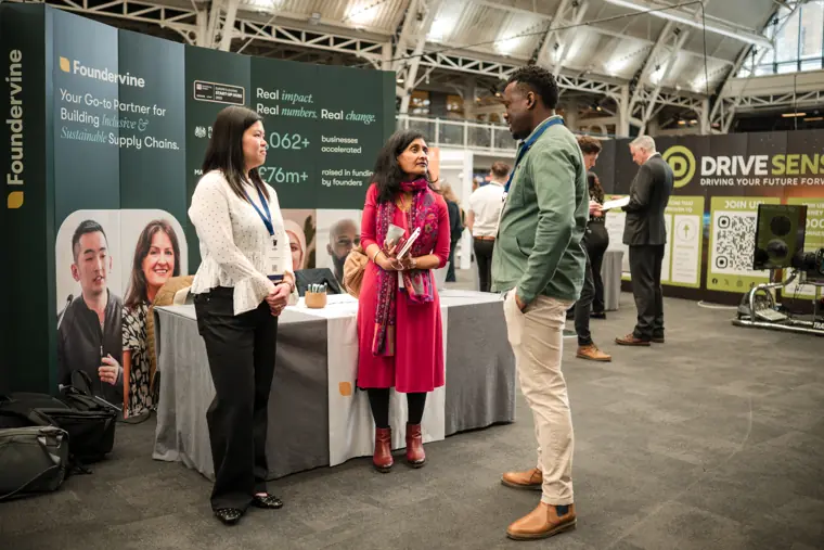 Foundervine team with an attendee.