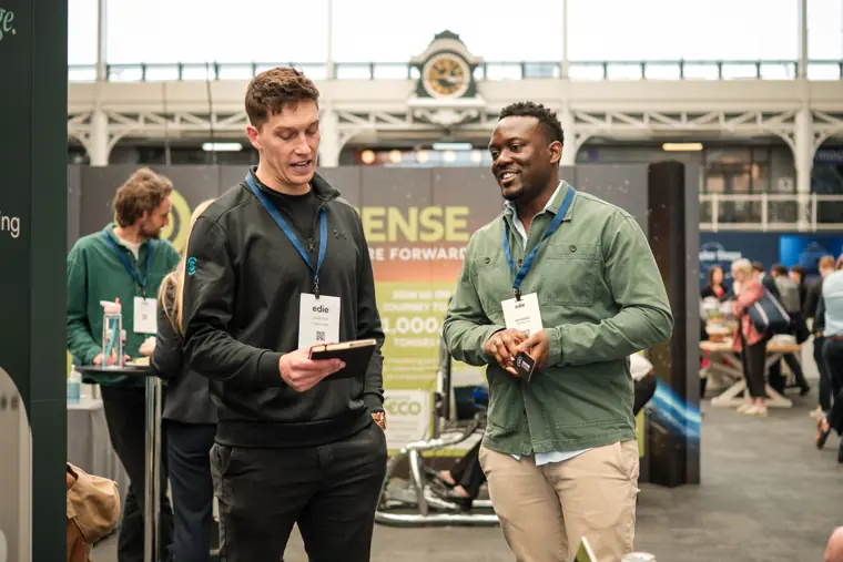 Foundervine representative meeting a delegate.