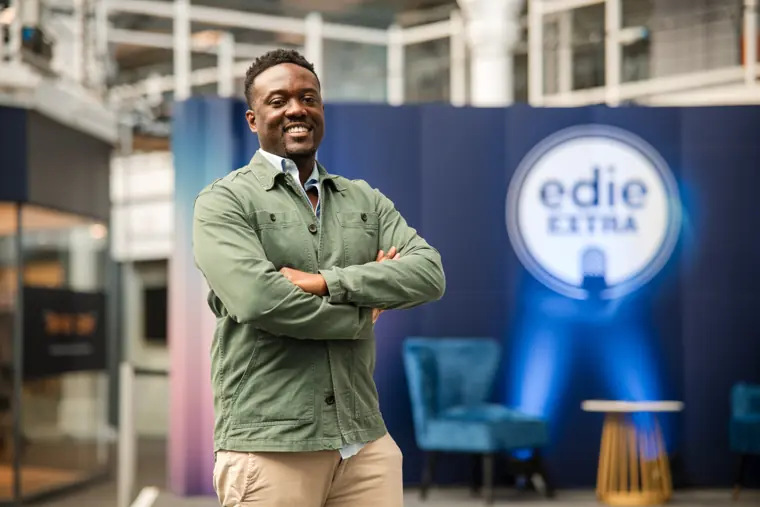Portrait beside edie Extra branding.