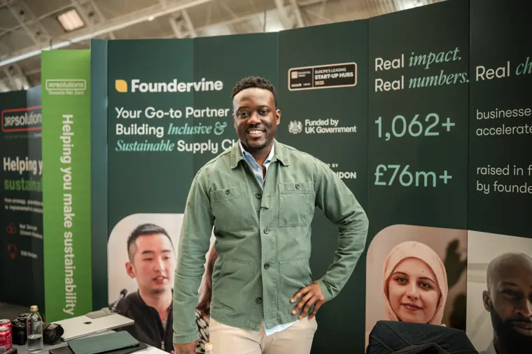 Foundervine team member at their stand.