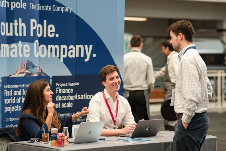 Conversation at an exhibitor stand.