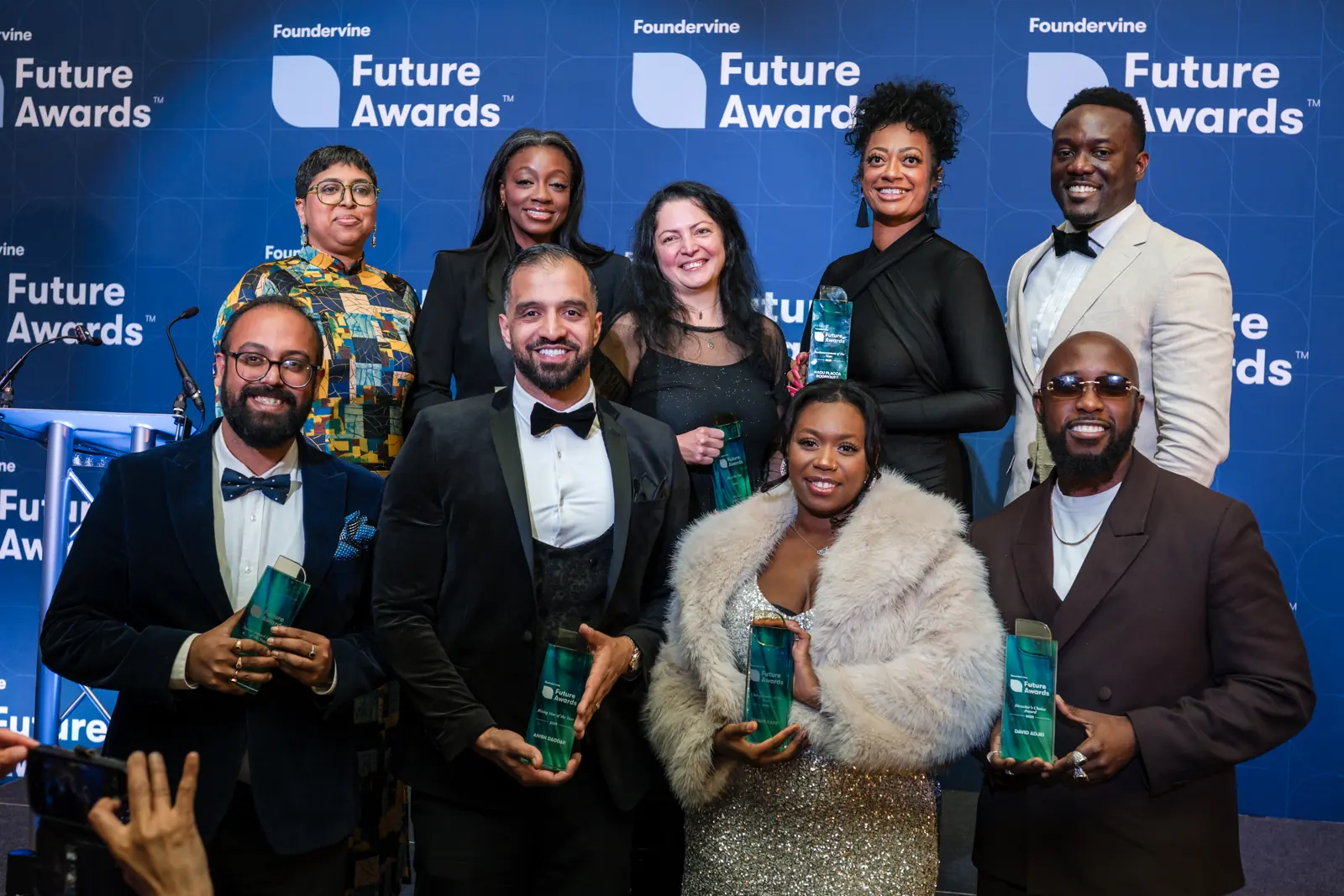 Award recipients pose together after the ceremony.