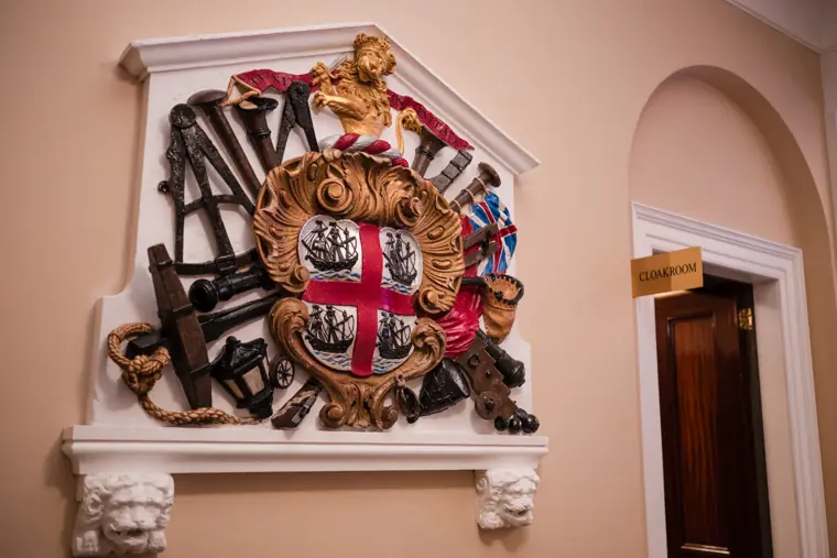 The venue crest above the reception space.
