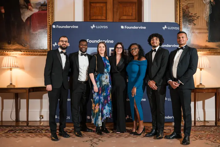 Foundervine guests gather for a formal group portrait.