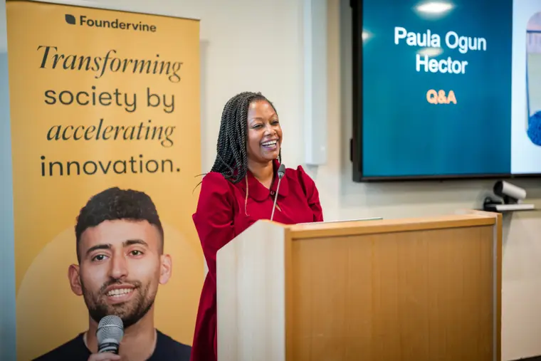 A founder speaks beside the showcase question-and-answer slide.