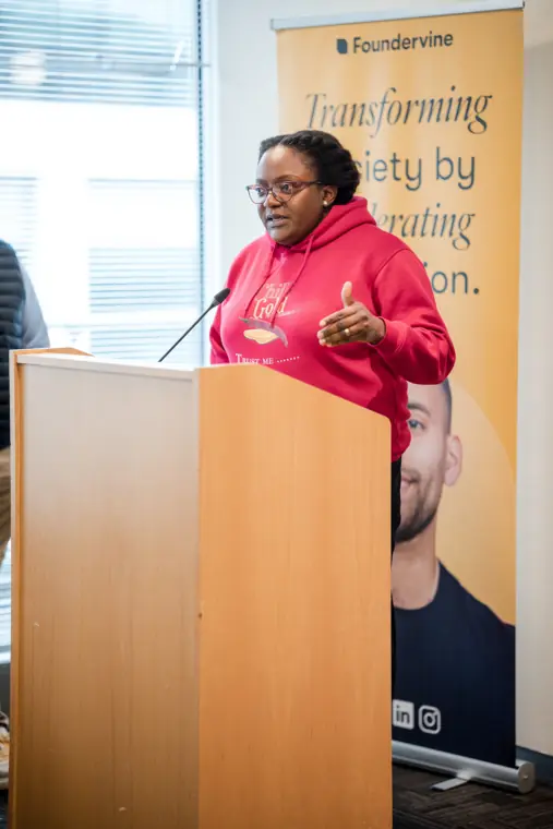 A speaker introduces her business at the showcase.
