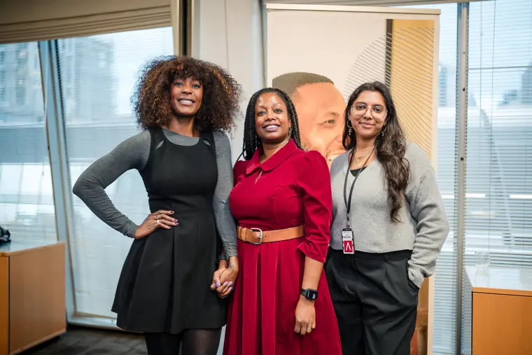 Three founders pose together during the showcase.
