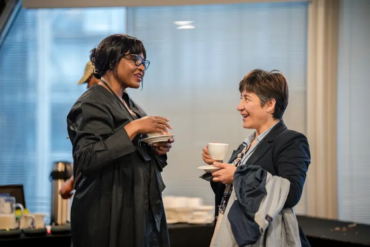 Guests connect over refreshments after the pitches.