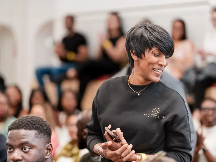 A guest smiles during the programme.