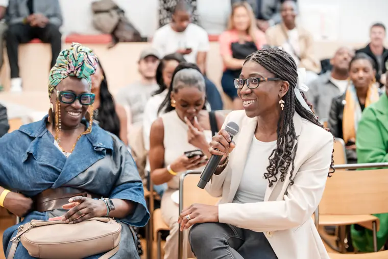 A guest asks a question during the session.