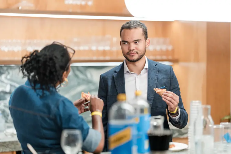 A guest stands at a founder stall.