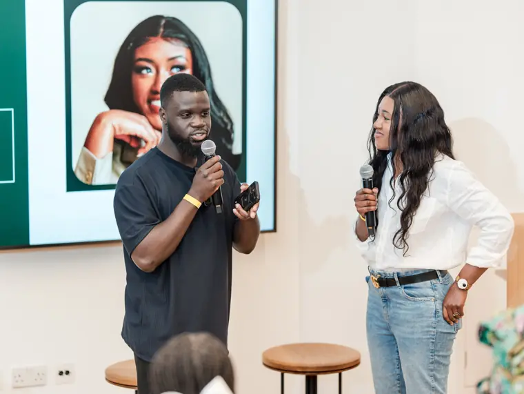 A founder and host share the microphone.