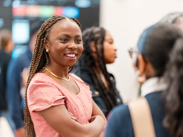 An attendee smiles during the gathering.