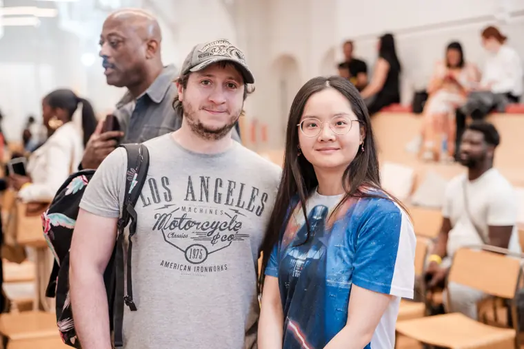 Two guests pose during the event.