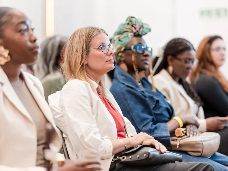 Guests listen as the programme continues.