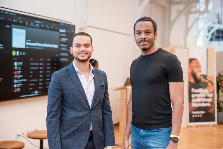 Two founders pose for a portrait.
