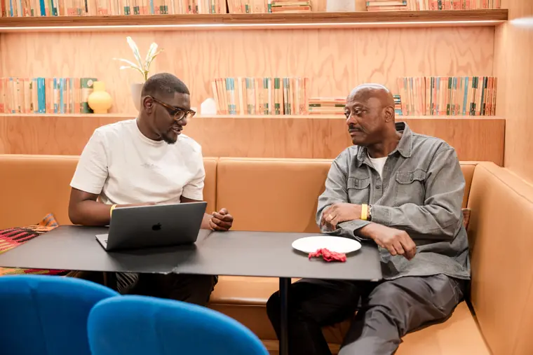 Two guests meet for a mentoring conversation.