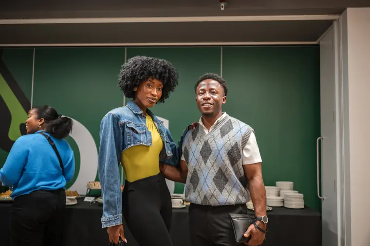 Two attendees pause for a portrait.