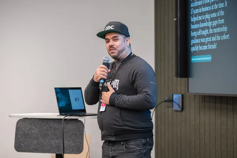 A founder speaks to the audience.