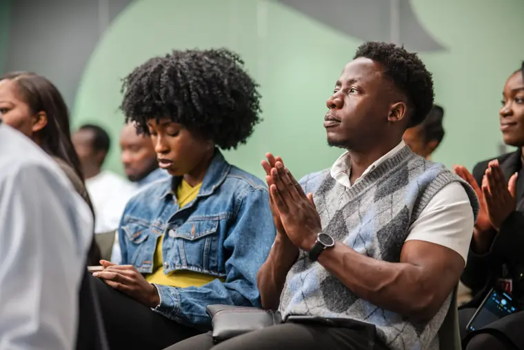 Guests respond to a founder pitch.