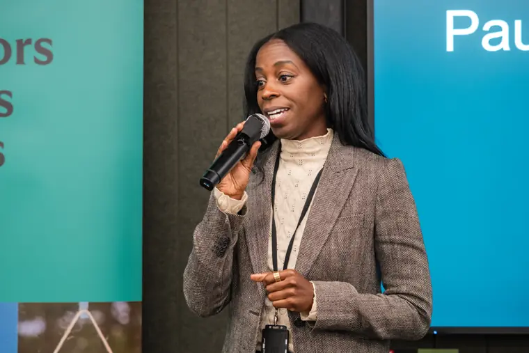 A founder addresses the audience on stage.