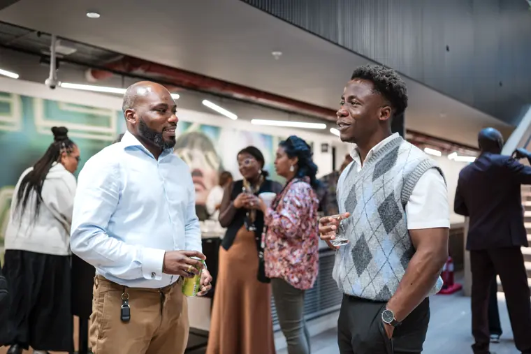 Founders and guests meet during the reception.