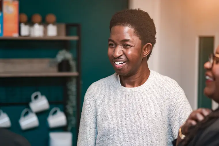 A founder smiles inside the event venue.