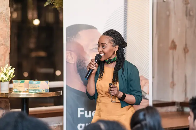 A founder explains her business to the audience.