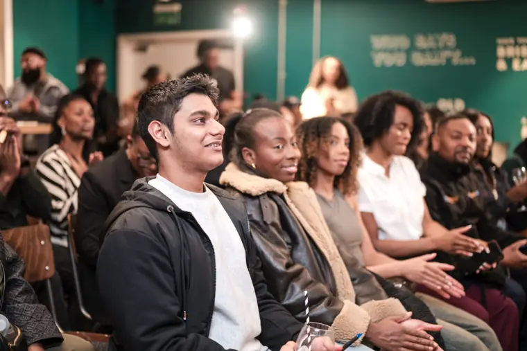 Attendees listen to the founder presentations.