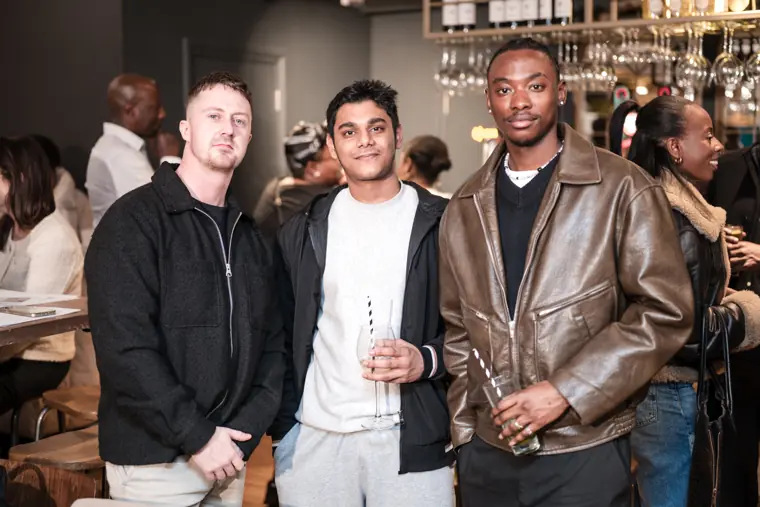 Guests enjoy the reception after the pitches.