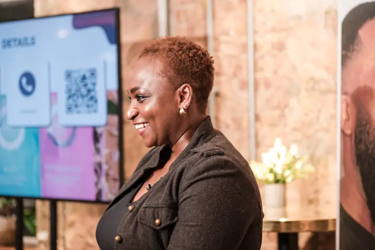 An attendee smiles during the event.