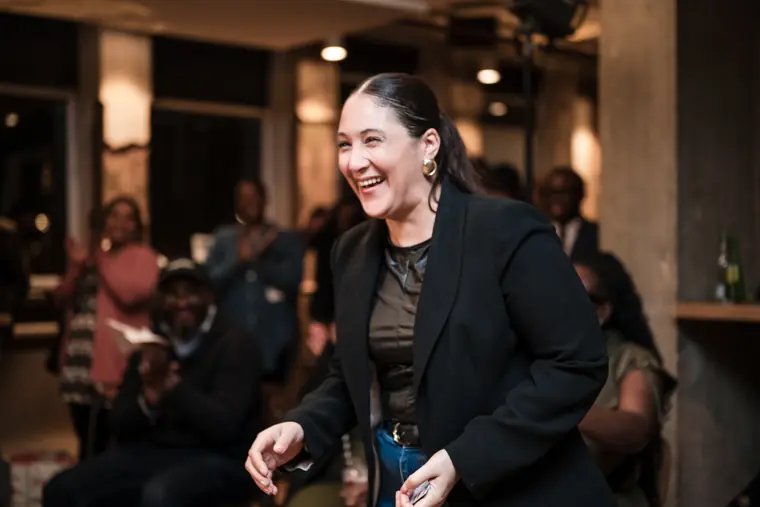 A founder smiles after her presentation.