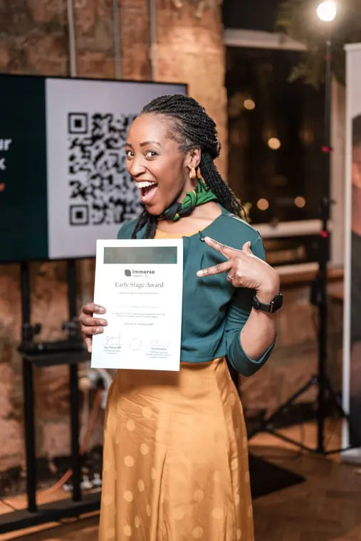 An award recipient poses for a portrait.