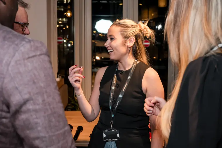 Guests connect between presentations.