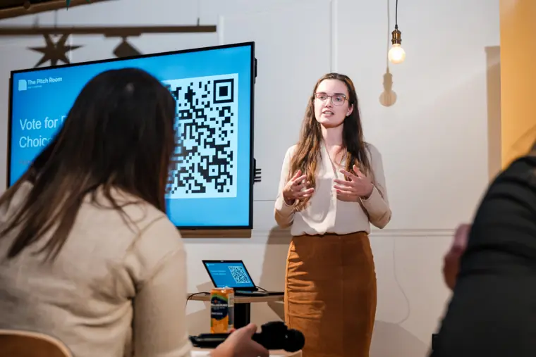 A founder speaks to the audience.