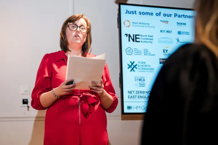 A host addresses the founders and judges.