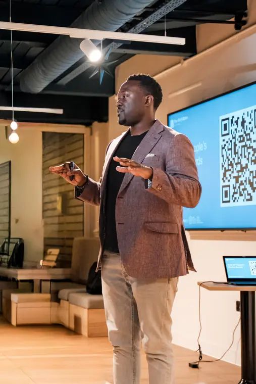 A founder explains his business to the room.