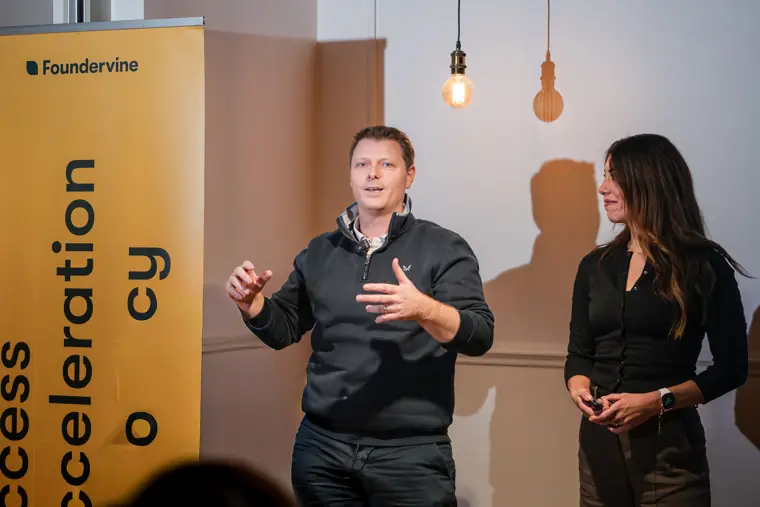 A speaker addresses the Pitch Room audience.