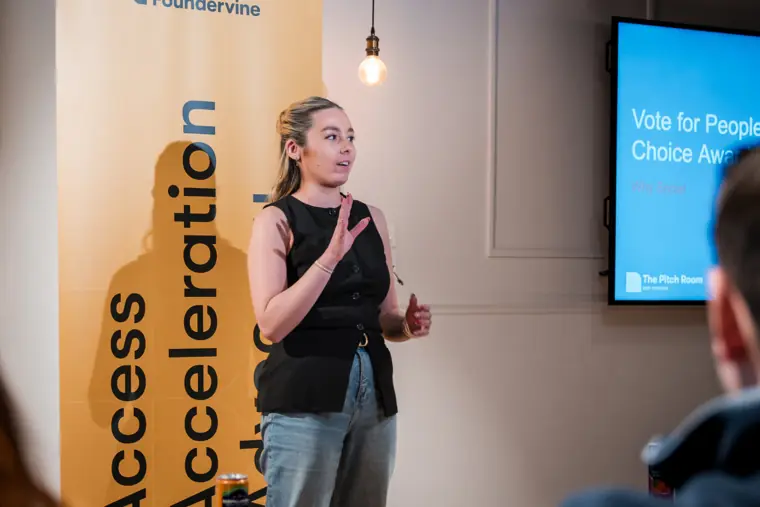 A founder pitches to the judges.