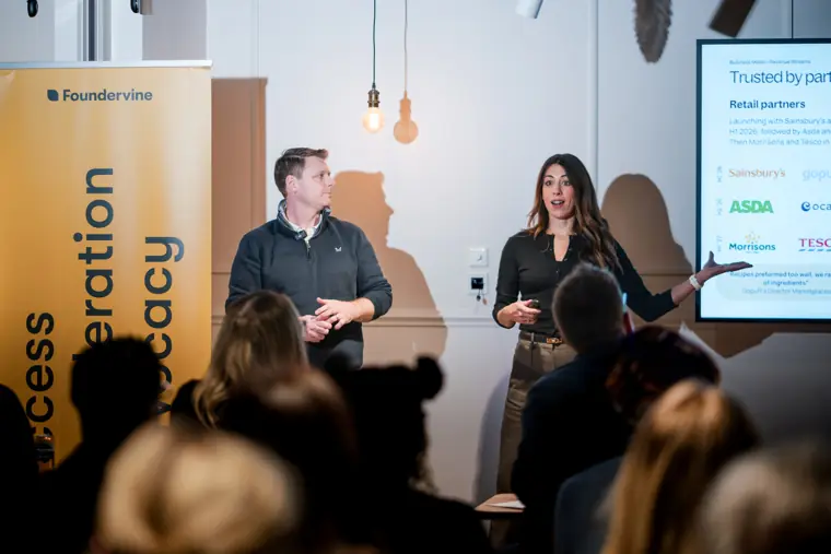 Two speakers share the stage.