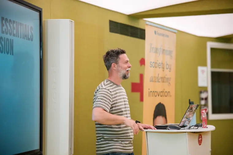 The AI Essentials workshop speaker with participants.