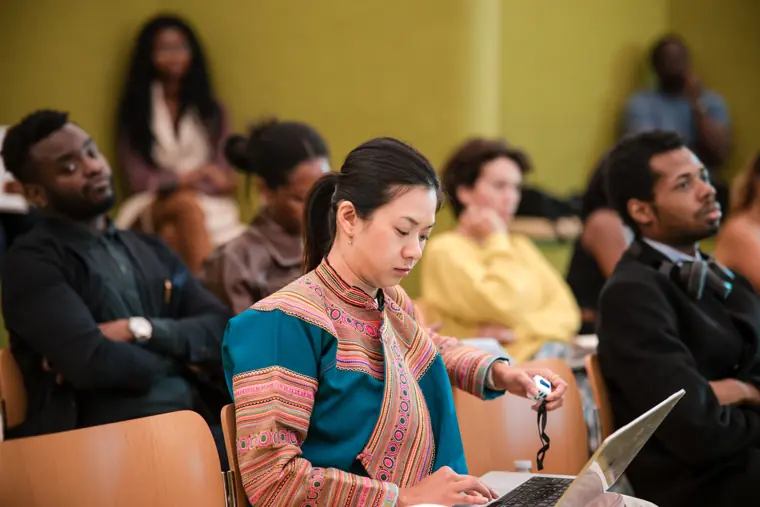 A participant responds during the programme event.