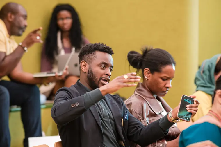 A participant responds during the programme event.
