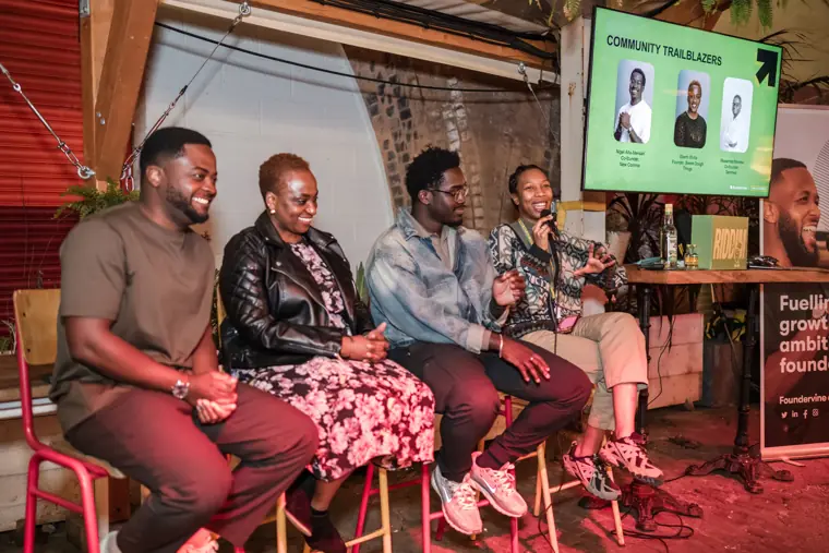 Panelists discuss their experiences on stage.