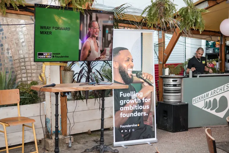 A Foundervine display welcomes visitors.